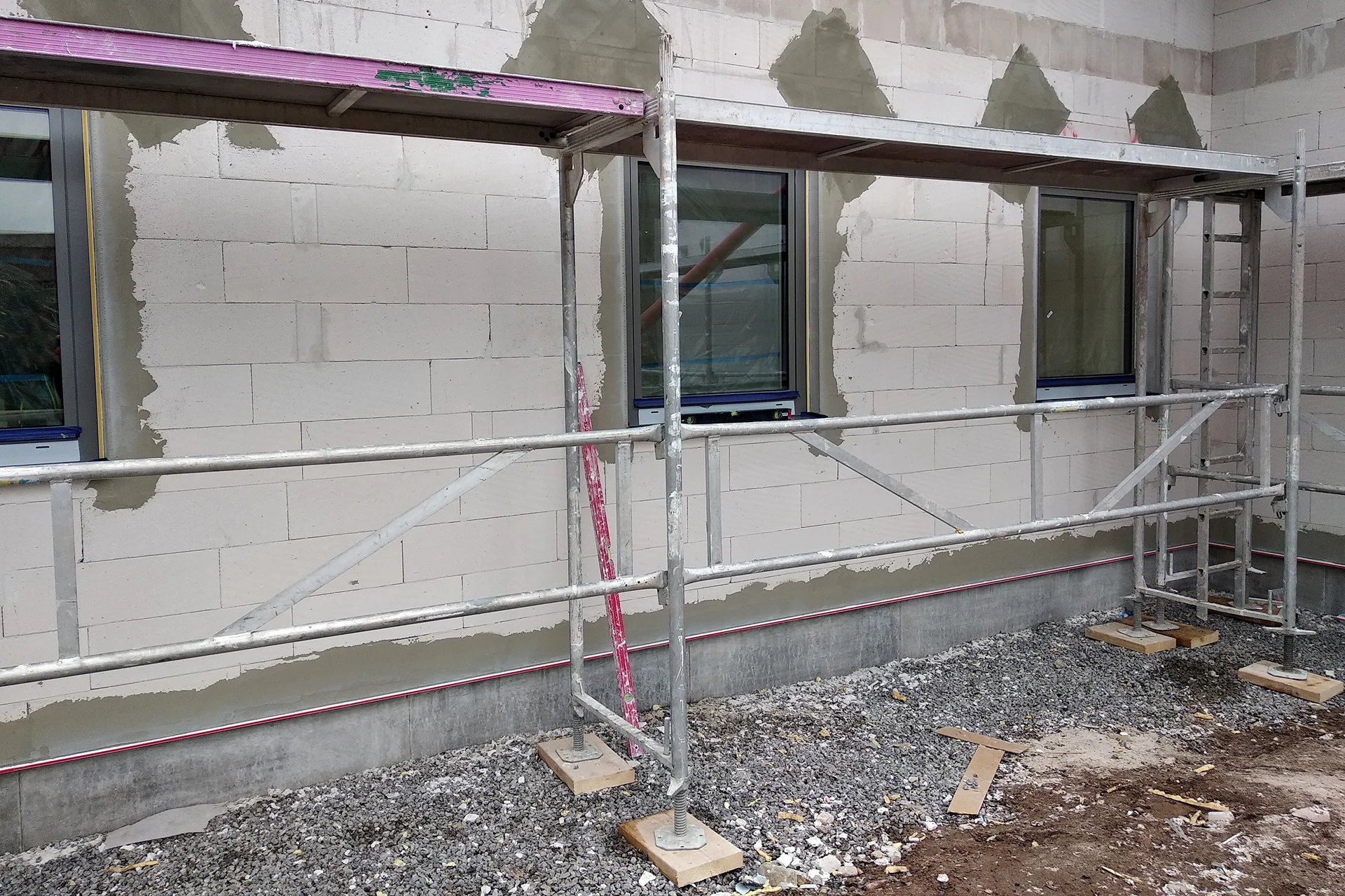 facade-of-building-made-from-white-blocks-with-big